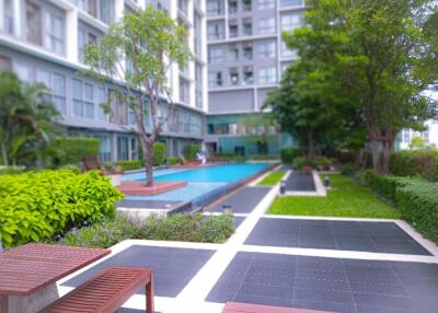Residential complex with swimming pool and greenery