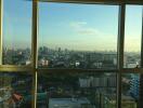 Panoramic city view from high-rise apartment windows