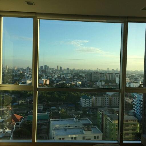 Panoramic city view from high-rise apartment windows