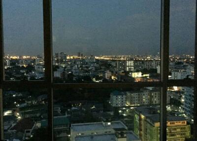 City view from a high-rise apartment at night