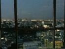 City view from a high-rise apartment at night