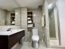 Modern bathroom with spacious shower and beige tile design