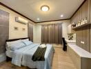 Cozy bedroom with modern design, queen-size bed, and air conditioning
