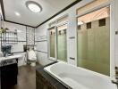 Clean and modern bathroom with shower and bathtub
