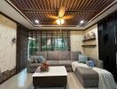 Elegant living room with contemporary sofa and wooden ceiling design