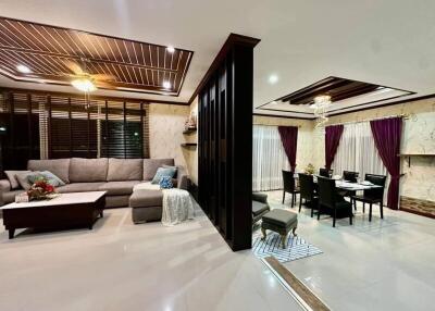 Elegant living room with dining area and contemporary decor
