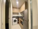 Compact laundry room with modern appliances