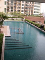 Modern residential building with outdoor swimming pool