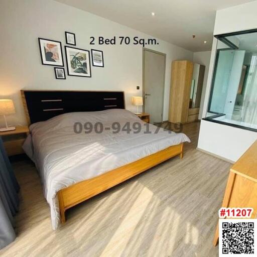 Modern bedroom with ample natural light and en-suite bathroom