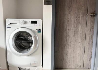 Modern laundry room with Electrolux washing machine