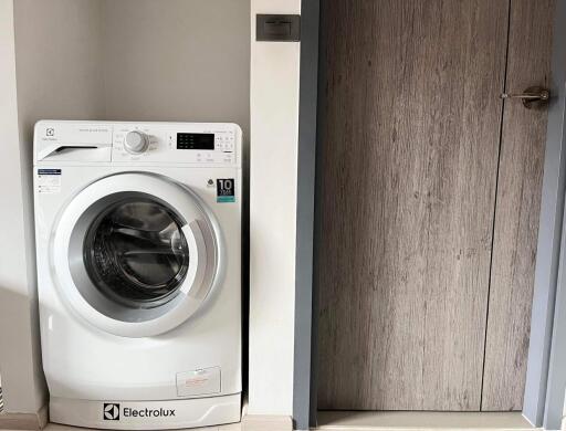 Modern laundry room with Electrolux washing machine