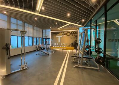 Spacious modern gym with various exercise equipment