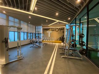 Spacious modern gym with various exercise equipment