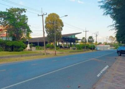 Street view with visible outdoor parking area and surrounding neighborhood