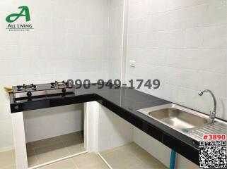 Compact kitchen with gas stove and single sink
