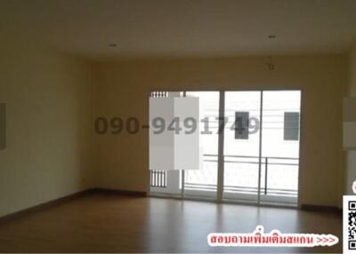 Spacious unfurnished living room with large window