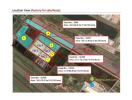 Aerial view of factory complex for sale or lease with marked plots