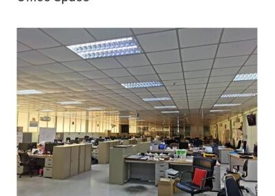 Spacious open plan office with numerous workstations