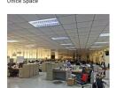 Spacious open plan office with numerous workstations