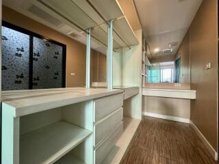 Modern kitchen with wooden floor and ample counter space