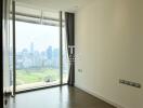 Bright bedroom with floor-to-ceiling window overlooking the city