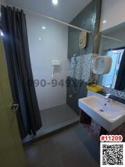 Modern bathroom interior with shower and sink