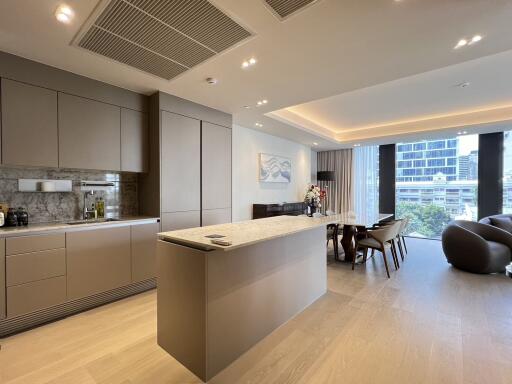 Modern open plan living space with kitchen and dining area