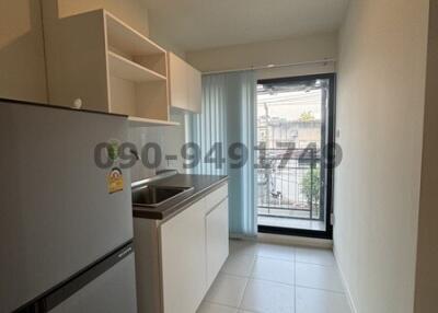 Compact modern kitchen with natural lighting