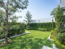 Lush garden with well-manicured lawn and variety of plants