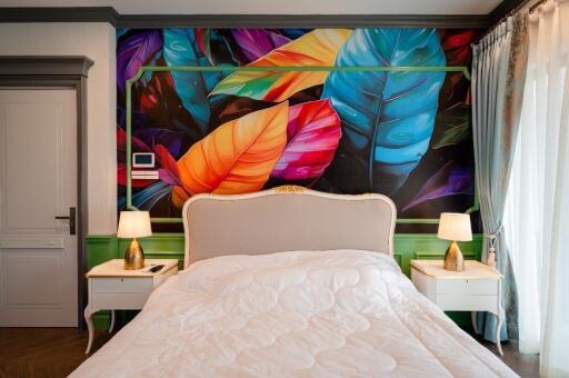 Colorful bedroom with artistic wall mural and modern design