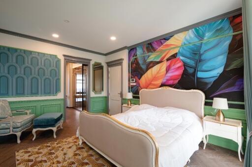 Spacious Bedroom with Colorful Wall Art and Elegant Furniture
