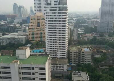 view of high-rise buildings from a window showing a dense urban area