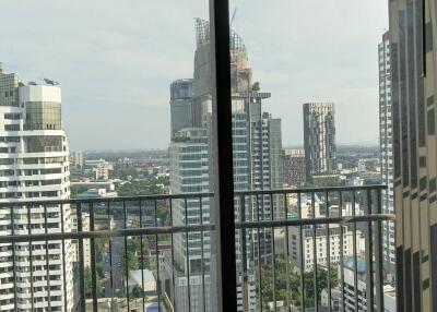 City view from a high-rise apartment balcony