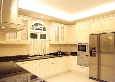 Spacious modern kitchen with stainless steel appliances