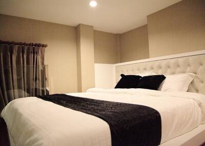 Elegant master bedroom with stylish decor