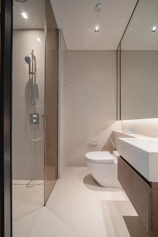 Modern bathroom with glass shower and clean design