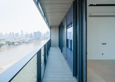 Spacious balcony with a city view in a modern apartment