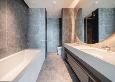 Modern bathroom interior with marble finishing and double vanity