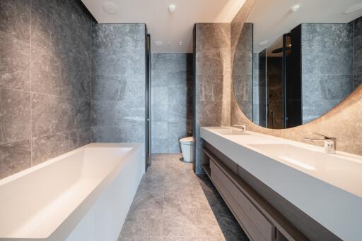 Modern bathroom interior with marble finishing and double vanity