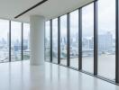 Spacious living room with floor-to-ceiling windows overlooking the city