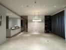 Contemporary building entrance with elegant lighting and marble wall design