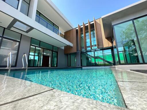 Modern house exterior with swimming pool