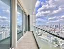 Spacious balcony with panoramic city view and clear sky