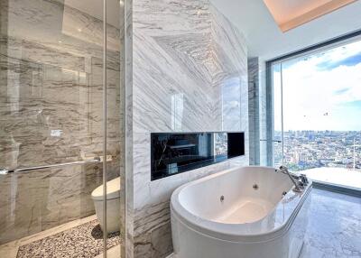 Luxurious marble bathroom with city view