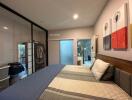 Spacious bedroom with modern design and en-suite bathroom