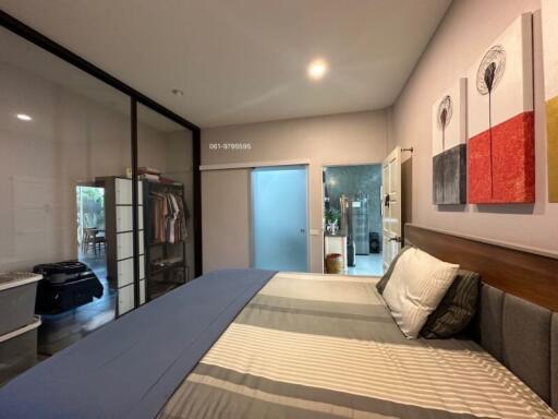 Spacious bedroom with modern design and en-suite bathroom