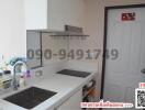 Modern kitchen with stainless steel sink and ample counter space