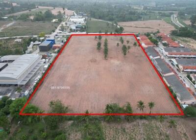 Aerial view of an expansive vacant land plot with demarcation lines