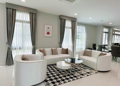 Spacious and modern living room with abundant natural light