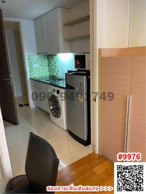 Compact kitchen with modern appliances and mosaic backsplash